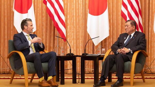 US Secretary of Defense Pete Hegseth, left, gives his opening speech at the beginning of his meeting with Japanese Prime Minister Shigeru Ishiba at the prime minister's office in Tokyo Sunday, March 30, 2025.  - Sputnik International