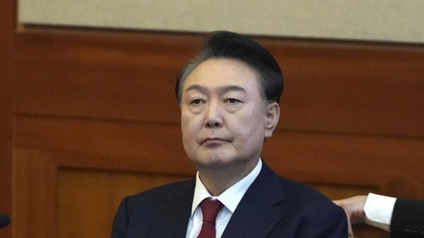 South Korea's impeached President Yoon Suk Yeol attends a hearing of his impeachment trial at the Constitutional Court in Seoul, South Korea, Tuesday, Feb. 11, 2025 - Sputnik International