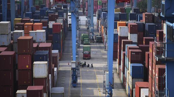 Containers are stacked at IPC Container Terminal at Tanjung Priok Port in Jakarta, Indonesia, Wednesday, April 9, 2025.  - Sputnik International