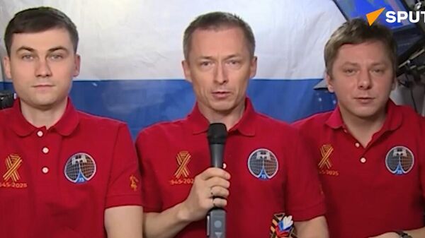Russian Cosmonauts join the launch of St. George Ribbon campaign from space - Sputnik International