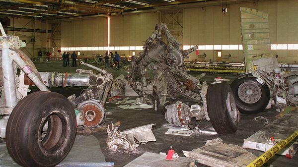 Pieces of the landing gear from TWA Flight 800 lay on the floor in an aircraft hanger in Calverton, N.Y. Tuesday, Sept. 24, 1996 in this photo released by the FBI in New York Friday, Sept. 27, 1996 - Sputnik International