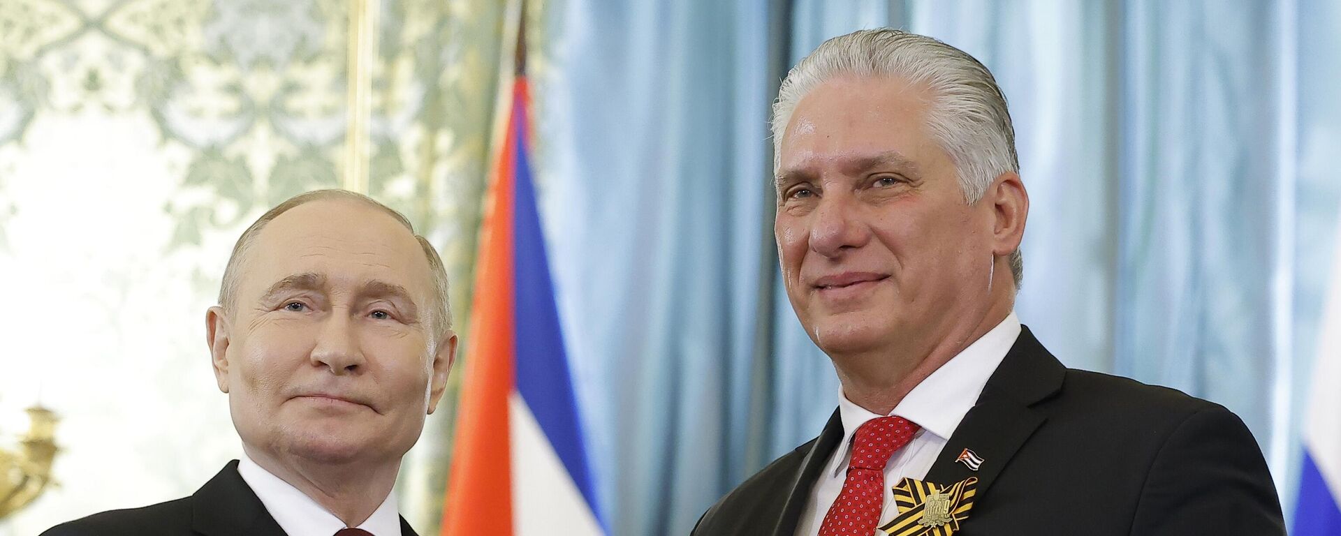 Russian President Vladimir Putin, left, and Cuban President Miguel Diaz-Canel pose for a photo during their meeting at the Great Kremlin Palace at the Kremlin in Moscow, Russia, on Thursday, May 9, 2024 - Sputnik International, 1920, 04.05.2025