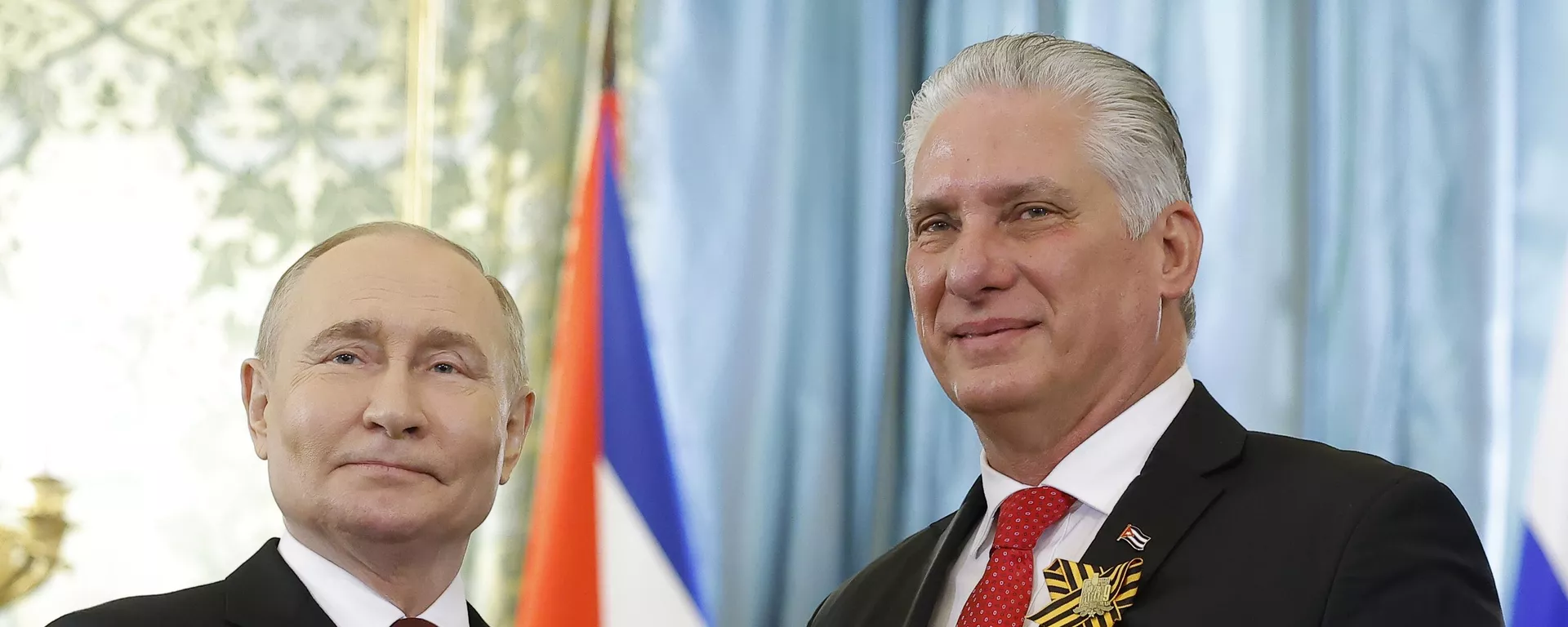 Russian President Vladimir Putin, left, and Cuban President Miguel Diaz-Canel pose for a photo during their meeting at the Great Kremlin Palace at the Kremlin in Moscow, Russia, on Thursday, May 9, 2024 - Sputnik International, 1920, 04.05.2025