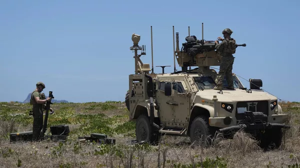 U.S. Marines prepare a U.S. Marine Air Defense Integrated System (MADIS), before a live-fire joint Philippines and U.S. military exercise called Balikatan at a Philippine Navy training camp in San Antonio, Zambales province, northern Philippines, Sunday, April 27, 2025.  - Sputnik International