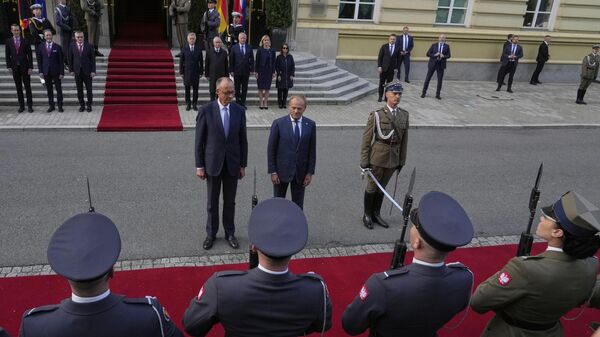 Polish Prime Minister Donald Tusk meets with German Chancellor Friedrich Merz - Sputnik International