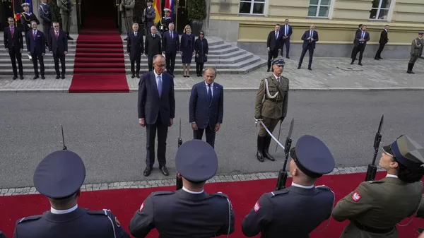 Polish Prime Minister Donald Tusk meets with German Chancellor Friedrich Merz - Sputnik International