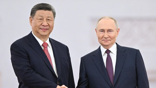 Vladimir Putin and Xi Jinping - Sputnik International