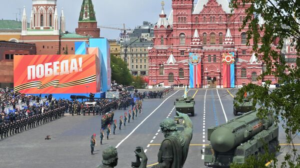 A Russian Yars intercontinental ballistic missile launcher drives during a military parade on Victory Day in Red Square in Moscow, Russia. - Sputnik International