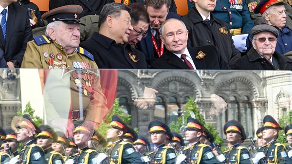 Presidents Putin and Xi and veterans look on as troops march past a protective glass barrier during Moscow's parade dedicated to the 80th anniversary of victory in the Great Patriotic War, Friday, May 9, 2025. - Sputnik International