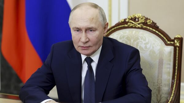 Russian President Vladimir Putin speaks during a video address to congratulate the military personnel and veterans of the Special Operations Forces, a branch of the Armed Forces of Russia, on their professional holiday at the Kremlin in Moscow, Russia, Thursday, Feb. 27, 2025 - Sputnik International