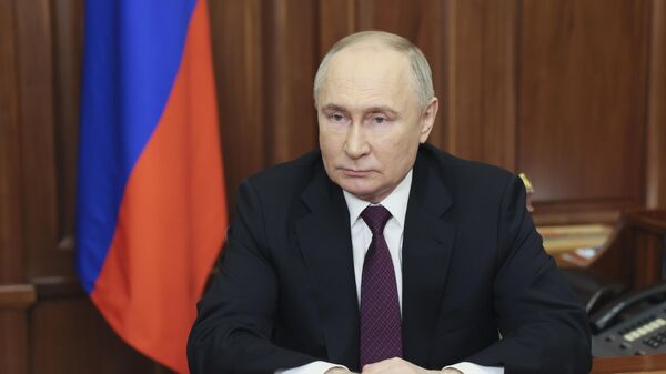 Russian President Vladimir Putin addresses voters in the 2024 presidential election at the Kremlin, in Moscow, Russia, Thursday, March 21, 2024 - Sputnik International