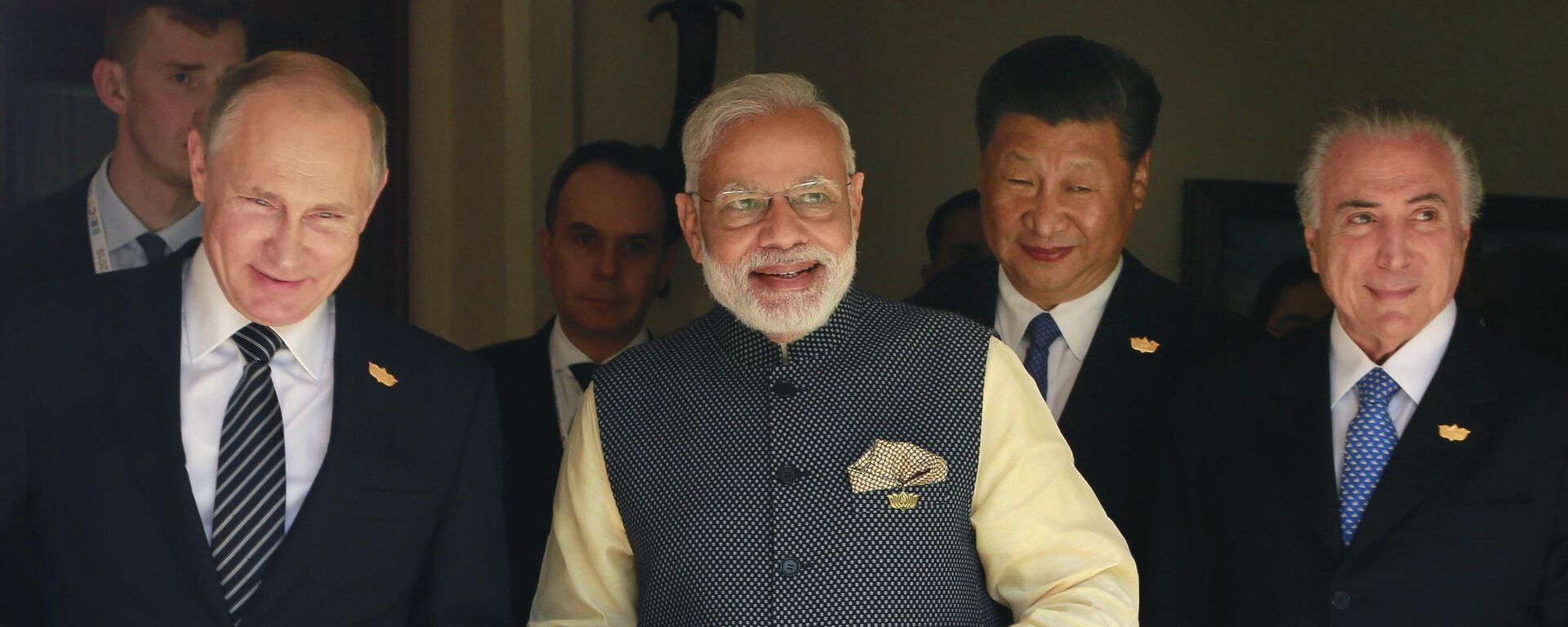 Leaders of BRICS countries, from left, Russian President Vladimir Putin, Indian Prime Minister Narendra Modi, Chinese President Xi Jinping, and former Brazilian President Michel Temer, arrive for a group photo for media at the start of the summit in Goa, India, Sunday, Oct. 16, 2016 - Sputnik International, 1920, 11.05.2025