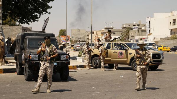 Libyan army forces and vehicles are stationed in a street in the country’s capital of Tripoli on Friday, July 22 2022 - Sputnik International