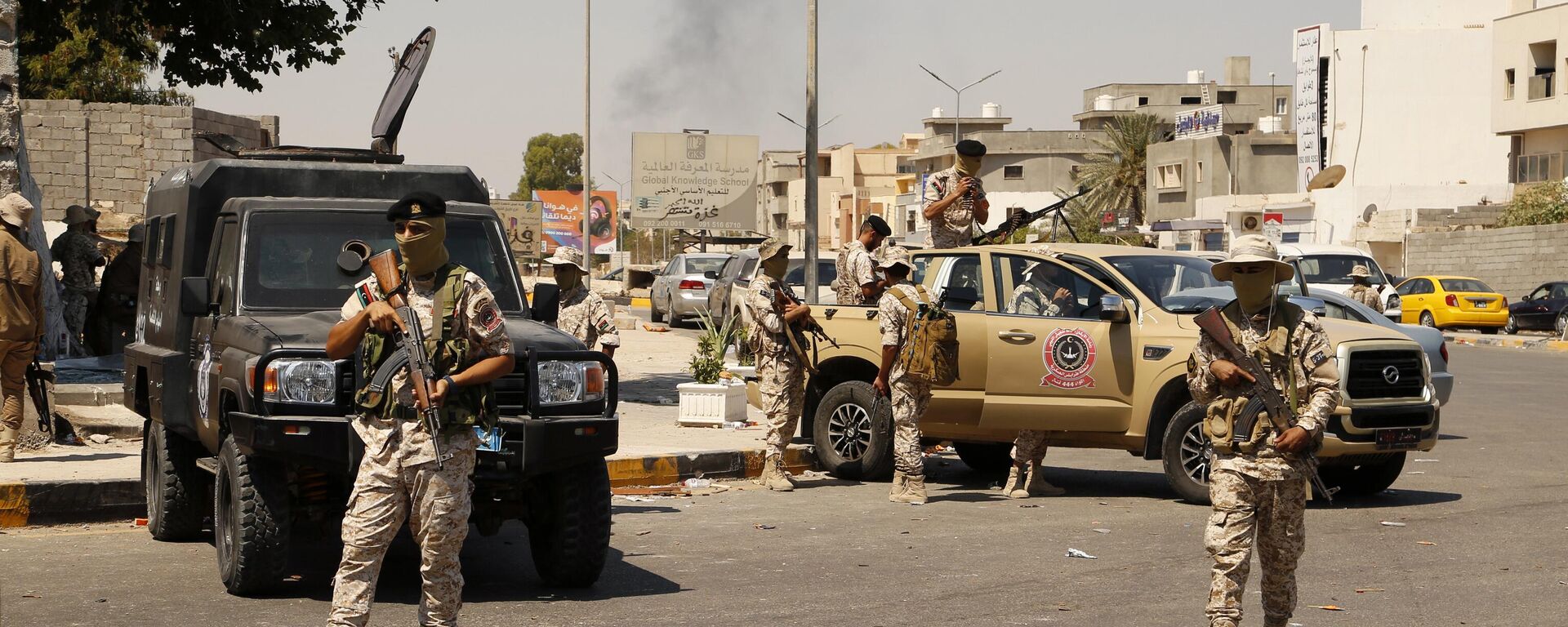 Libyan army forces and vehicles are stationed in a street in the country’s capital of Tripoli on Friday, July 22 2022 - Sputnik International, 1920, 13.05.2025