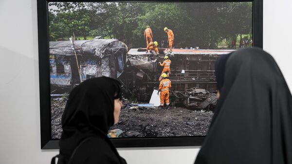 The exhibition of laureates of the 2024 Andrei Stenin International Photojournalism Contest in Tehran, Iran - Sputnik International