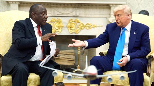 President Donald Trump meets South Africa's President Cyril Ramaphosa in the Oval Office of the White House, Wednesday, May 21, 2025, in Washington.  - Sputnik International