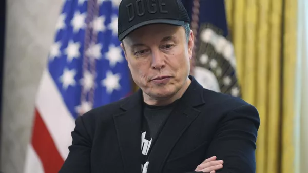 Elon Musk attends a news conference with President Donald Trump in the Oval Office of the White House, Friday, May 30, 2025, in Washington. - Sputnik International