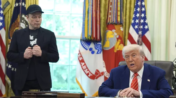 President Donald Trump speaks during a news conference with Elon Musk in the Oval Office of the White House, Friday, May 30, 2025, in Washington.  - Sputnik International