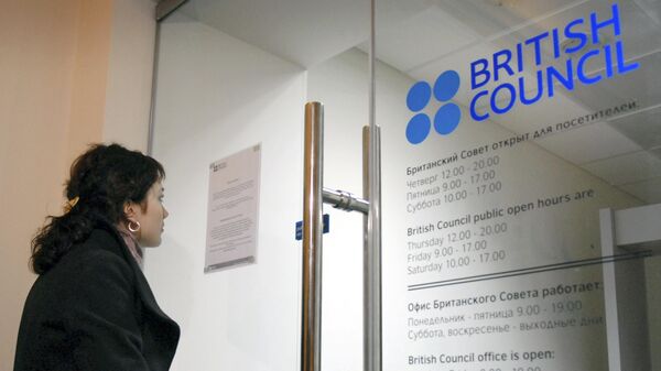 A woman looks at the temporary closure notice at the entrance to the British Council office in St. Petersburg, Russia. File photo. - Sputnik International