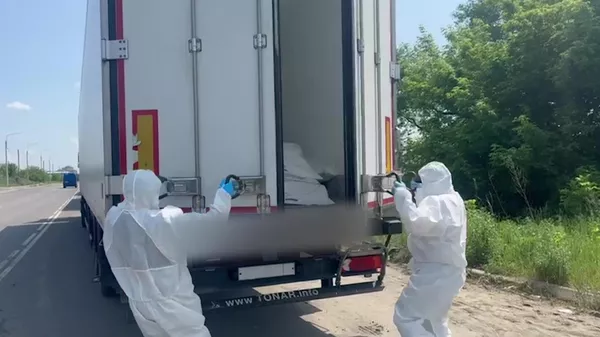 A convoy carrying the bodies of fallen Ukrainian soldiers has arrived at the exchange area. - Sputnik International