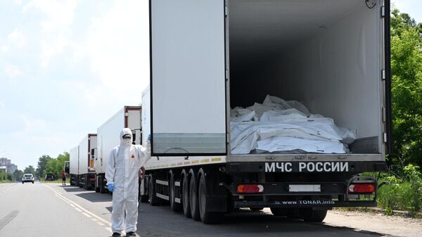 Refrigerated trucks with 1,212 bodies of dead Ukrainian servicemen in the Bryansk region. - Sputnik International
