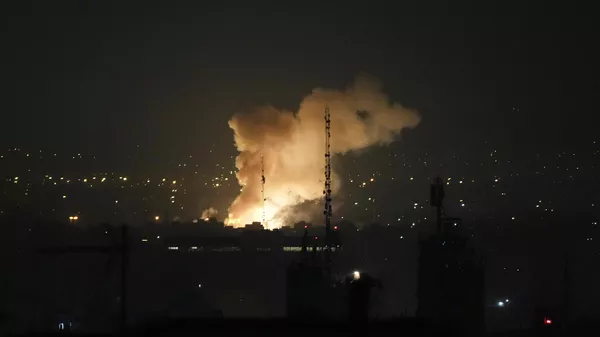 Smoke rises up after an explosion in Tehran, Iran, Friday, June 13, 2025. - Sputnik International