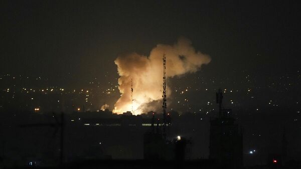 Smoke rises up after an explosion in Tehran, Iran, Friday, June 13, 2025. - Sputnik International