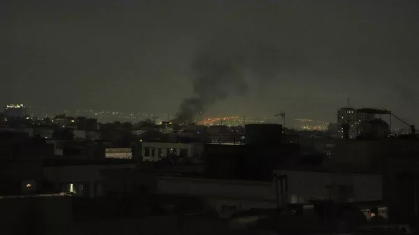 Smoke rises up to the sky, in Tehran, Iran, Friday, June 13, 2025.  - Sputnik International