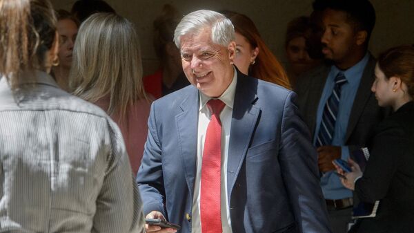 Sen. Lindsey Graham, R-S.C., right, departs following a classified briefing on President Donald Trump's directed strikes on Iranian nuclear facilities, Washington, Thursday, June 26, 2025. - Sputnik International