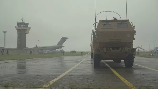 A M142 High Mobility Artillery Rocket System is positioned for a digital air-land raid at Bornholm, Denmark May 24, 2022. Soldiers with Bravo Battery, 1st Battalion, 14th Field Artillery Regiment, 75th Artillery Brigade loaded up two HIMARS and two High Mobility Multipurpose Wheeled Vehicles into a Boeing C-17 Globemaster III in Saaremaa, Estonia and were transported to the Danish island to conduct the exercise. This mission was in conjunction with DEFENDER-Europe 22 a series of U.S. Army Europe and Africa multinational training exercises within U.S. European Command’s Large Global Scale Exercise construct taking place in Eastern Europe. - Sputnik International
