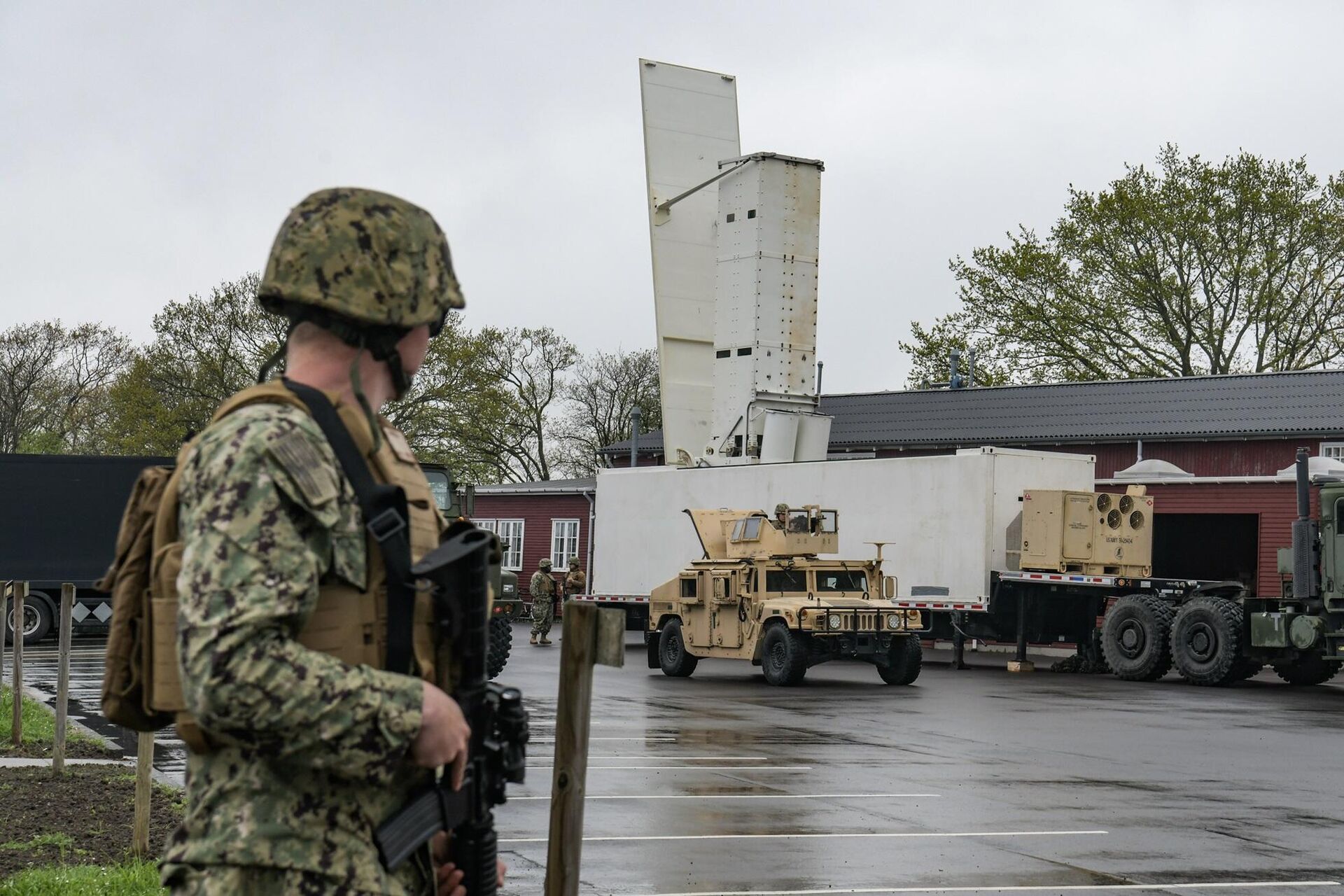 BORNHOLM, Denmark (May 6, 2024) - U.S. Navy Equipment Operator Constructionman Grant Sanford, assigned to Naval Mobile Construction Battalion (NMCB) 11, stands guard over a containerized missile launcher during a rehearsal in Bornholm, Denmark, May 6, 2024. BORNHOLM, Denmark (May 6, 2024) - U.S. Navy Equipment Operator Constructionman Grant Sanford, assigned to Naval Mobile Construction Battalion (NMCB) 11, stands guard over a containerized missile launcher during a rehearsal in Bornholm, Denmark, May 6, 2024. - Sputnik International, 1920, 14.07.2025
