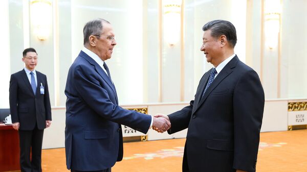 Russian Foreign Minister Sergey Lavrov and Chinese President Xi Jinping meeting in Beijing - Sputnik International