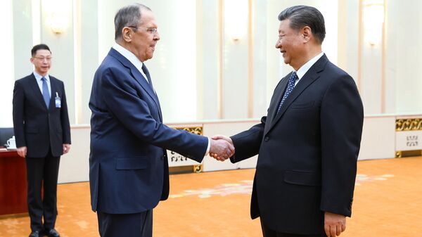 Russian Foreign Minister Sergey Lavrov and Chinese President Xi Jinping meeting in Beijing - Sputnik International