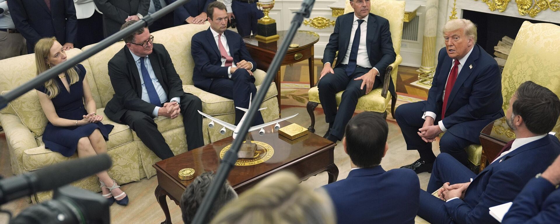 President Donald Trump, from right, speaks during a meeting with NATO Secretary General Mark Rutte in the Oval Office of the White House, Monday, July 14, 2025, in Washington.  - Sputnik International, 1920, 15.07.2025