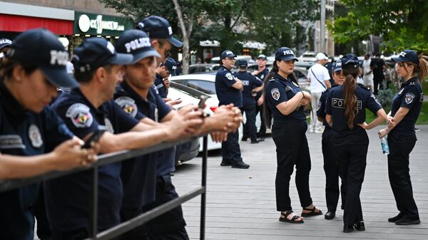 Armenian police officers at a rally in Yerevan. July 4, 2025. - Sputnik International