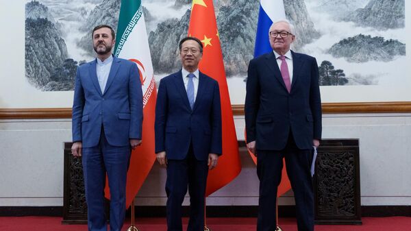 Iranian Deputy Foreign Minister Kazem Gharibabadi, Chinese Deputy Foreign Minister Ma Zhaoxu and Russian Deputy Foreign Minister Sergei Ryabkov (from left to right) during a meeting at the Diaoyutai State Residence in Beijing. The parties discussed the Iranian nuclear program and cooperation between the three countries. - Sputnik International