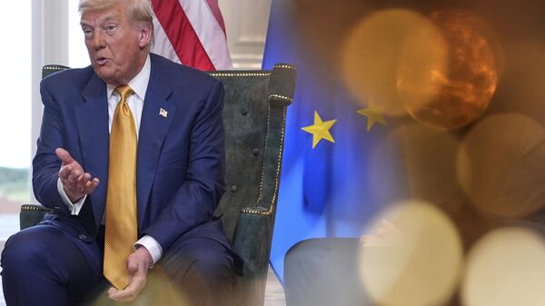 President Donald Trump speaks as he meets European Commission President Ursula von der Leyen at the Trump Turnberry golf course in Turnberry, Scotland Sunday, July 27, 2025.  - Sputnik International