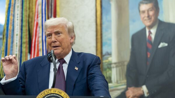 Donald Trump speaks in the Oval Office, Wednesday, Aug. 6, 2025 - Sputnik International