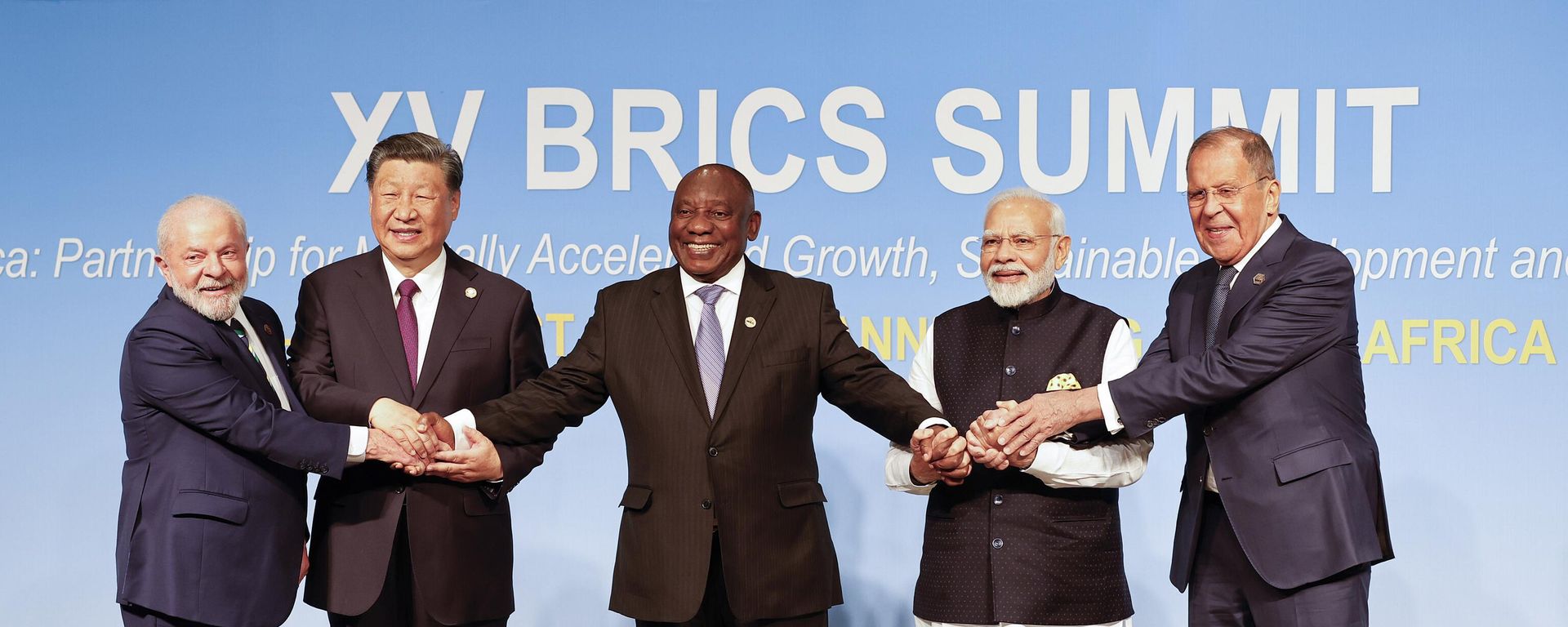 From left, Brazil President Luiz Inacio Lula da Silva, China President Xi Jinping, South African President Cyril Ramaphosa, Prime Minister of India Narendra Modi and Russia's Foreign Minister Sergei Lavrov pose for a BRICS family photo during the 2023 BRICS Summit at the Sandton Convention Centre in Johannesburg, South Africa, Wednesday, Aug. 23, 2023.  - Sputnik International, 1920, 28.08.2026