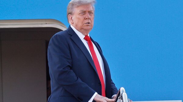 President Donald Trump boards Air Force One at Joint Base Andrews, Md., Friday, Aug. 15, 2025, en route to a meeting with Russian President Vladimir Putin in Alaska. - Sputnik International