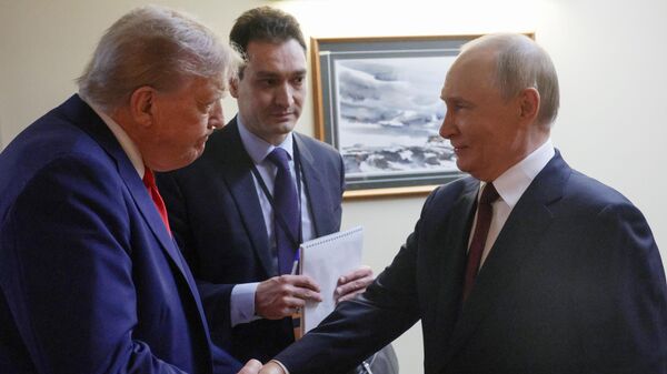 Russian President Vladimir Putin and his US counterpart Donald Trump are seen during their summit in Alaska on August 15, 2025.  - Sputnik International
