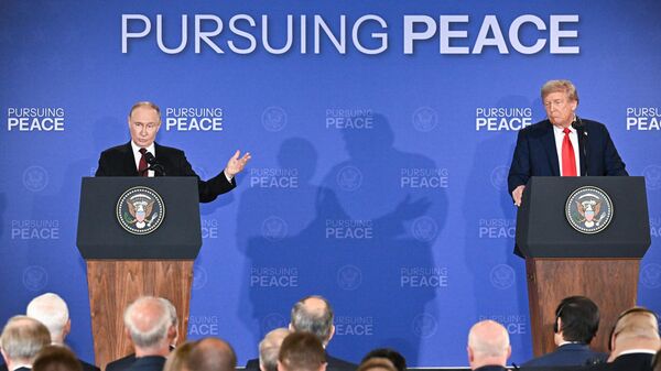 Russian President Vladimir Putin and US President Donald Trump at the press conference following their meeting in Anchorage, Alaska. August 15, 2025. - Sputnik International