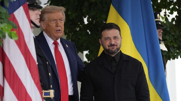 President Donald Trump greets Ukraine's Volodymyr Zelensky at the White House, Monday, Aug. 18, 2025, in Washington. - Sputnik International