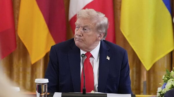 US President Donald Trump participates in a meeting with Volodymyr Zelensky and European leaders in the East Room of the White House, Monday, Aug. 18, 2025, in Washington.  - Sputnik International