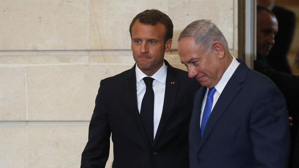 French President Emmanuel Macron and Israel's Prime Minister Benjamin Netanyahu arrive for a joint press conference at the Elysee Palace, in Paris, Tuesday, June 5, 2018. - Sputnik International