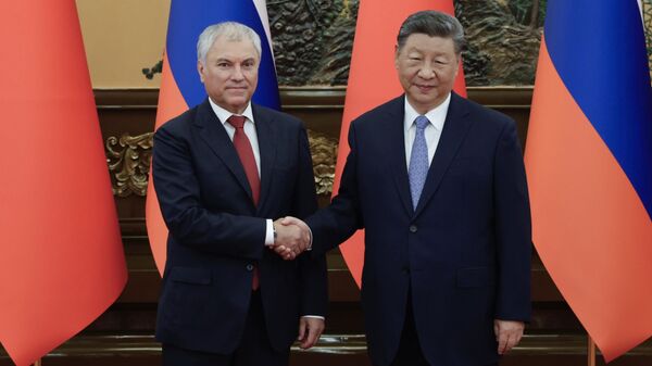 Chinese President Xi Jinping met with Russian State Duma Chairman Vyacheslav Volodin in Beijing - Sputnik International