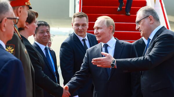August 31, 2025. Russian President Vladimir Putin arrived at Binhai Airport in the city of Tianjin, China. On the right: Russian Ambassador to China Igor Morgulov. Third from the left: Chinese Ambassador to Russia Zhang Hanhui. - Sputnik International