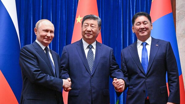September 2, 2025 — Russian President Vladimir Putin, Chinese President Xi Jinping, and Mongolian President Ukhnaagiin Khürelsükh (left to right) during a joint photo session in Beijing.
 - Sputnik International