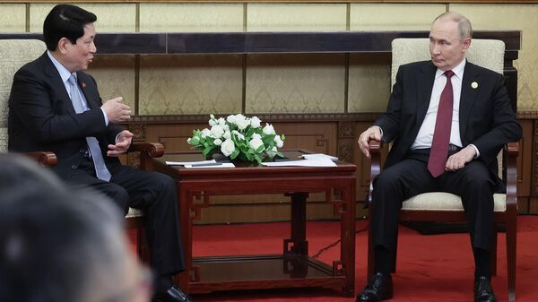 September 3, 2025. Russian President Vladimir Putin and President of the Socialist Republic of Vietnam Luong Cuong during a meeting in Beijing. - Sputnik International