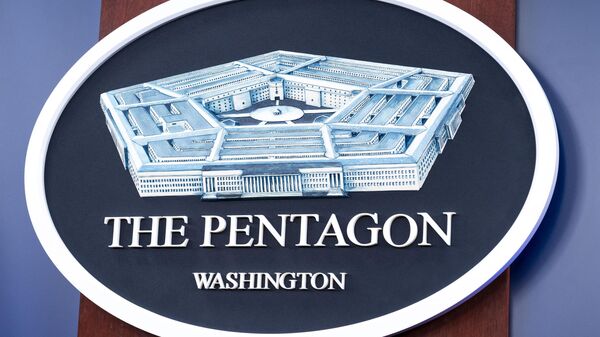 The US Department of Defense logo is seen on the wall in the Press Briefing room at the Pentagon, Oct. 29, 2024, in Washington. - Sputnik International
